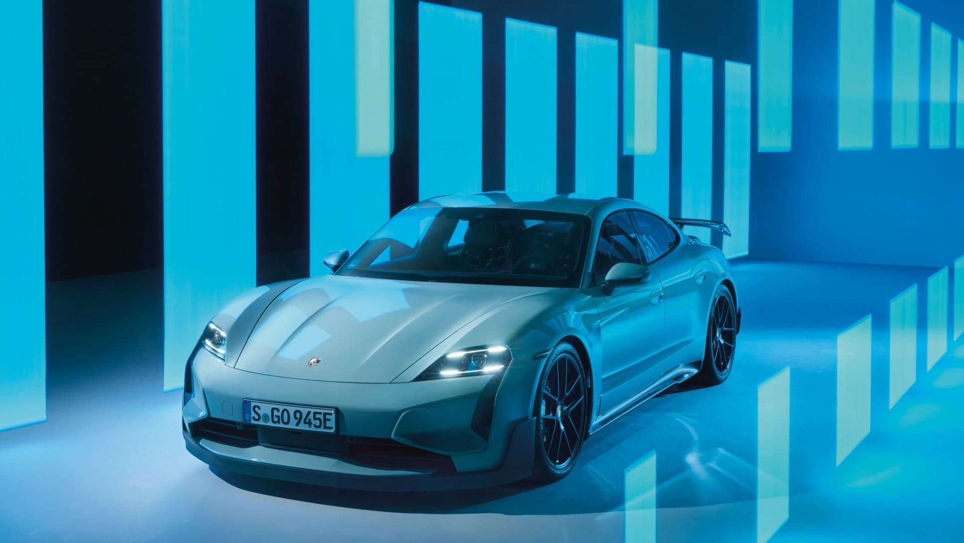 A light blue Porsche Taycan Turbo GT